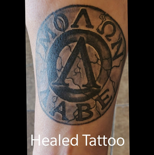 Explore red cardinal tattoo ideas, creative tattoo ideas in Copperas Cove, available at Black Moon Tattoo Company