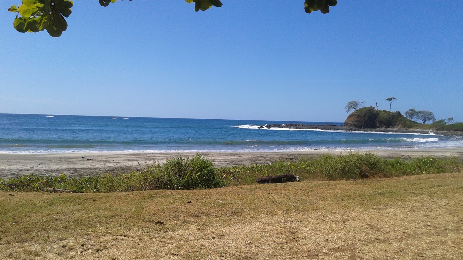 Photo de Pitahaya Beach avec l'eau cristalline de surface