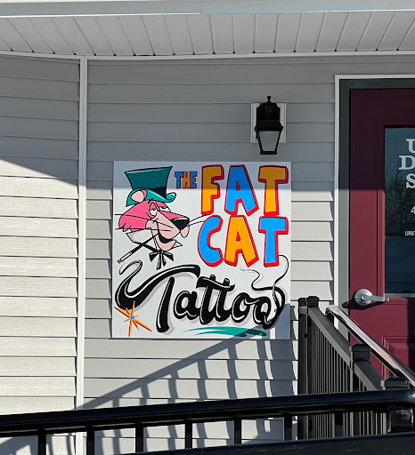 Explore arm cross tattoo ideas, creative tattoo ideas in Ludlow, available at The Fat Cat Tattoo