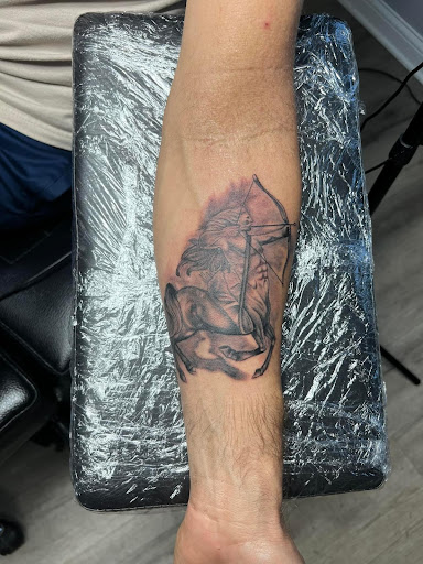 Explore cover up tattoo ideas leg, creative tattoo ideas in Kenosha, available at Kenosha Tattoo Company
