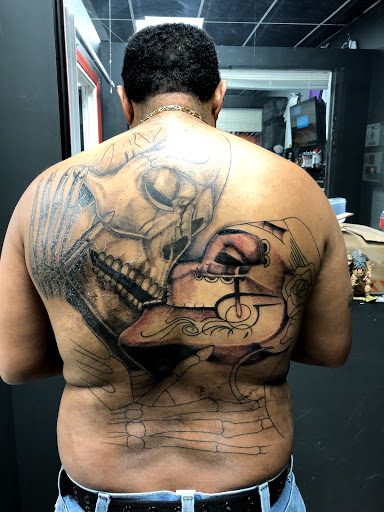 Find tattoo ideas crown for your next unique tattoo in Bridgeport at Evolution Tattoo