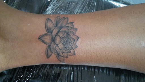 Explore yankee tattoo ideas, creative tattoo ideas in Fort Myers, available at Tiger Lotus Tattoo and Piercing