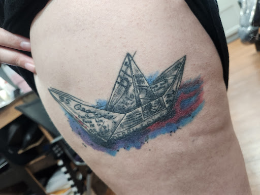 Explore hippie tattoo ideas, creative tattoo ideas in Rogers, available at Saved by Grace Tattoo Studio