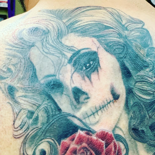 Explore melanoma tattoo ideas, creative tattoo ideas in Tacoma, available at Island Sons Ink