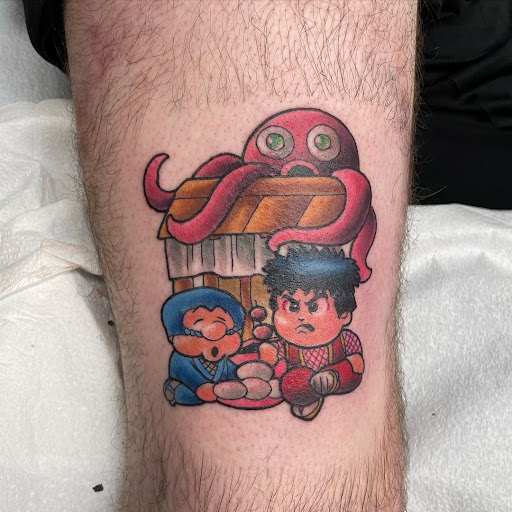 Explore purple flower tattoo ideas, creative tattoo ideas in Gloucester City, available at 12 oz. Studios Tattoos and Piercing Brooklawn