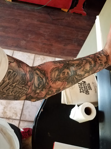 Explore jesus tattoo sleeve ideas, creative tattoo ideas in Greenwood, available at The Center Street Parlour
