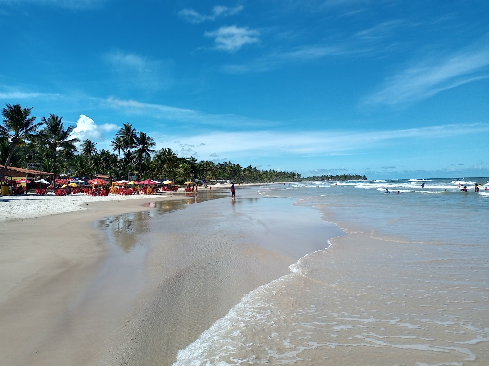 Foto av Praia do Ramo med lång rak strand