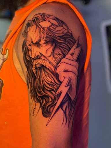 Explore gangster tattoo ideas for men, creative tattoo ideas in Donora, available at Alchemy Arts Tattoo & Permanent Makeup Studio