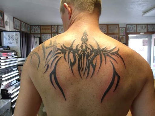 Explore dave matthews band tattoo ideas, creative tattoo ideas in Elko, available at Tom Custom Tattoos and Body Piercing Studio