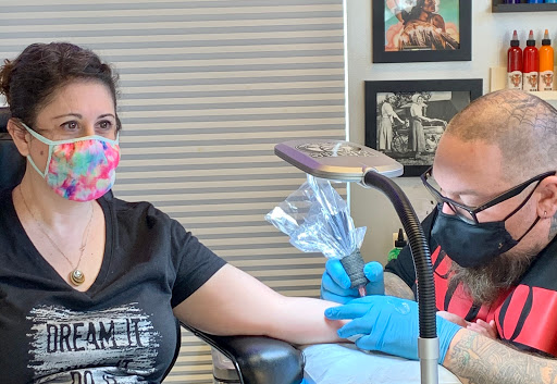 Explore dragon tattoo ideas for women, creative tattoo ideas in Lake Bluff, available at Evolution Body Arts