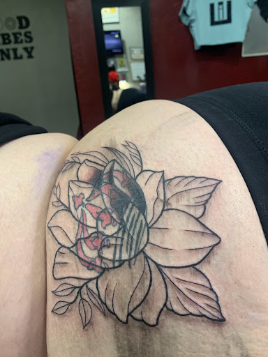 Explore flower spine tattoo ideas, creative tattoo ideas in Cape Coral, available at UNRIVALED INK