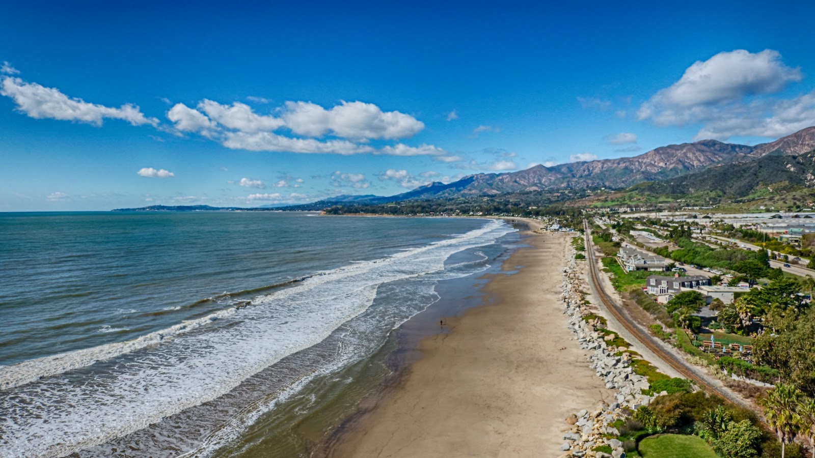 Santa Claus Beach的照片 带有长直海岸