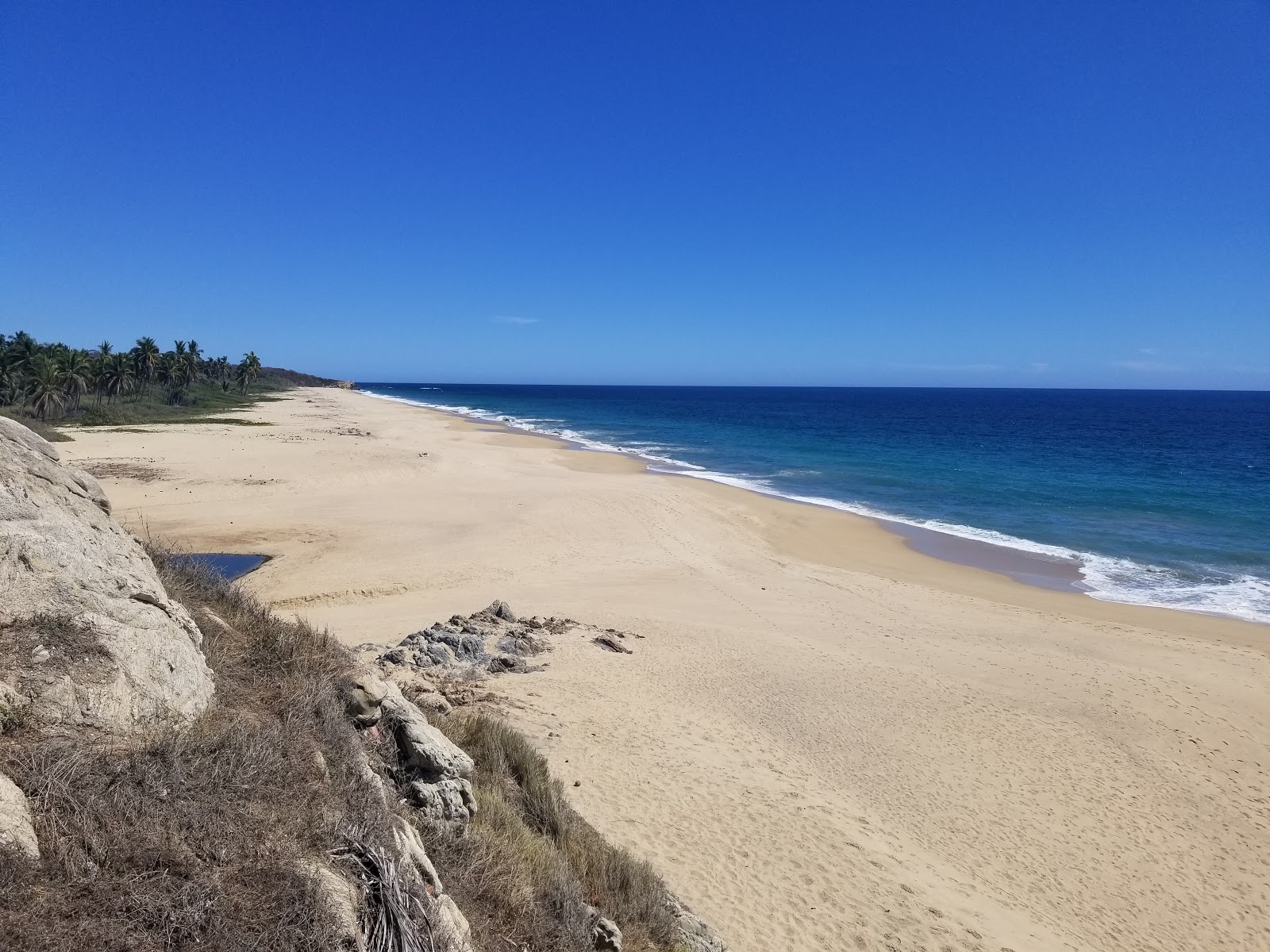 Foto de Zapotengo beach com areia bege fina superfície