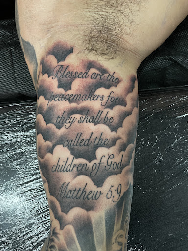 Explore aztec tattoo sleeve ideas, creative tattoo ideas in La Habra, available at Raining Ink Tattoo Studio