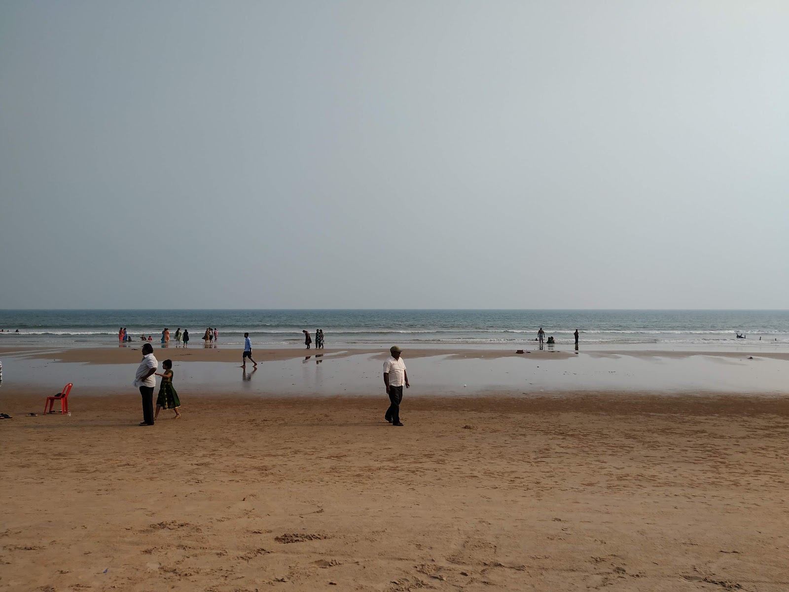 Valokuva Pandurangapuram Beachista. pinnalla turkoosi puhdas vesi:n kanssa