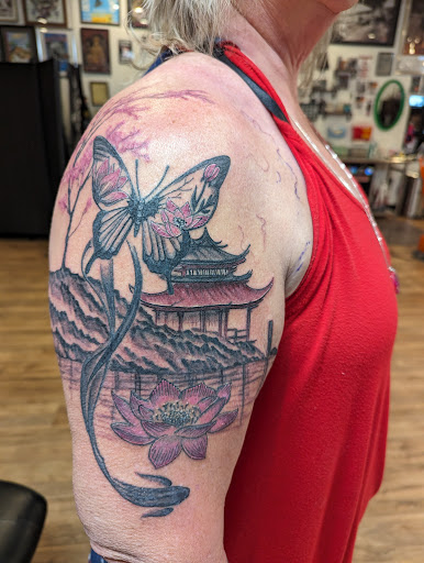 Explore snake tattoo idea, creative tattoo ideas in Redding, available at Caddy Daddys