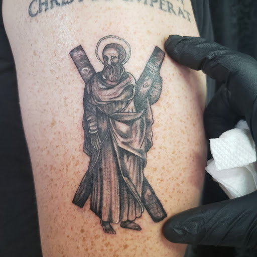 Explore men's back tattoos ideas, creative tattoo ideas in Mebane, available at The Cardinal Skin Art & Gallery