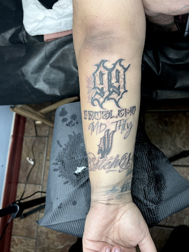 Explore under chin tattoo ideas, creative tattoo ideas in Upland, available at Classic Tattoo Studio