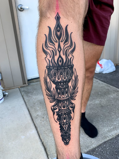 Explore american flag sleeve tattoo ideas, creative tattoo ideas in Fayetteville, available at Sacred Raven Tattoo Shop