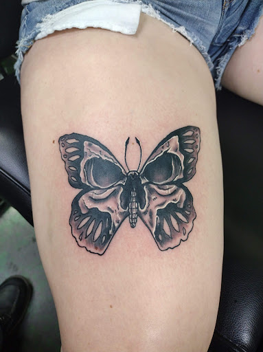 Find bat tattoo idea for your next unique tattoo in Springfield at Anchored Ink Tattoo & Piercing by SPLAT LLC