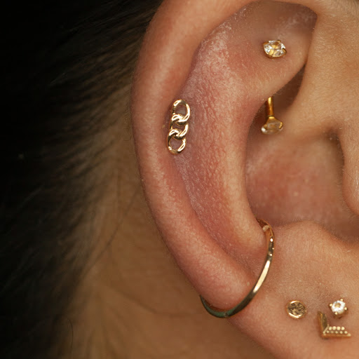 Explore cover up tattoo ideas female wrist, creative tattoo ideas in Boston, available at Arcadia Body Piercing