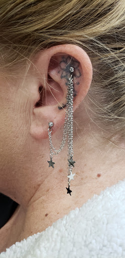 Explore mirrored tattoo ideas, creative tattoo ideas in Wilmington, available at Wildcard Studios