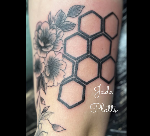 Explore blackout tattoo ideas, creative tattoo ideas in Lewisburg, available at Jolie Femme Permanent Makeup & Tiny Tattoos