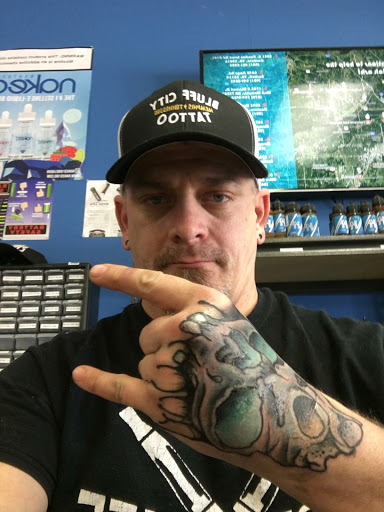 Explore arrow tattoo ideas for men, creative tattoo ideas in Memphis, available at Bluff City Tattoo