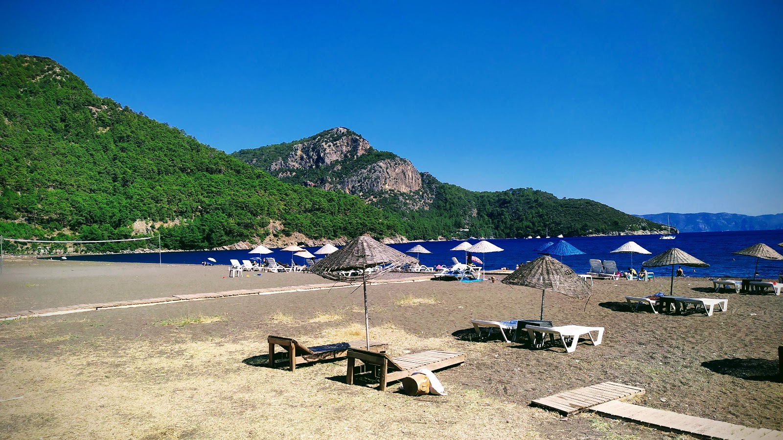 Foto di Ekincik beach II con una superficie del sabbia fine marrone