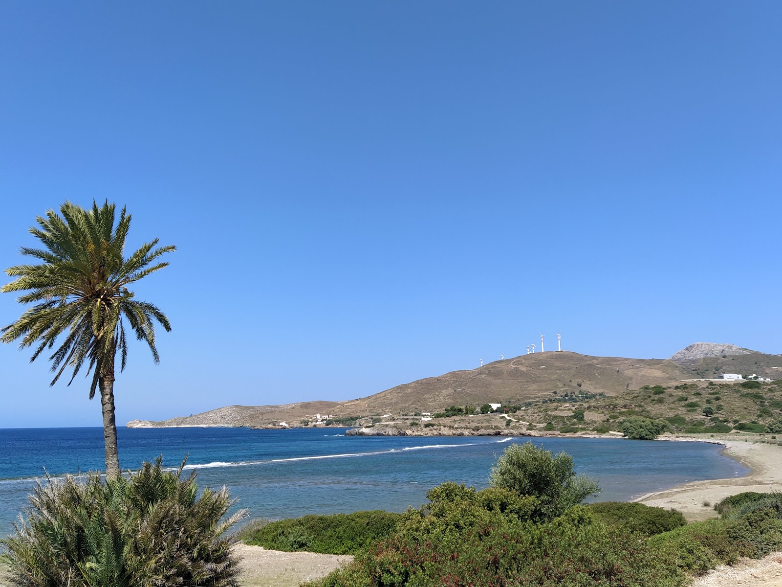 Germanou beach'in fotoğrafı turkuaz saf su yüzey ile