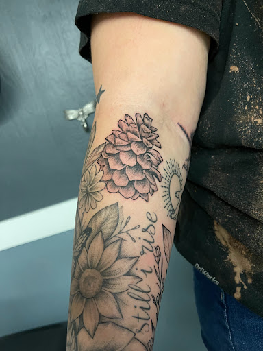 Explore top of foot tattoo ideas, creative tattoo ideas in Sanford, available at Luv Ink