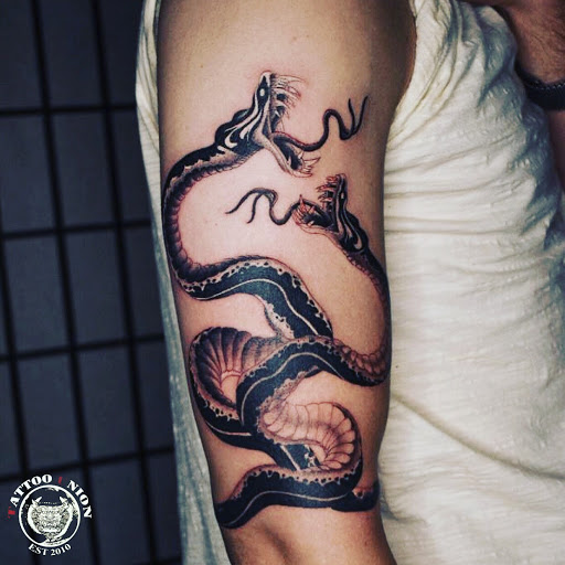 Explore mario name tattoo ideas, creative tattoo ideas in Chicago, available at TATTOO UNION CHICAGO