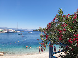 Rogaс beach'in fotoğrafı küçük bir koy ile birlikte