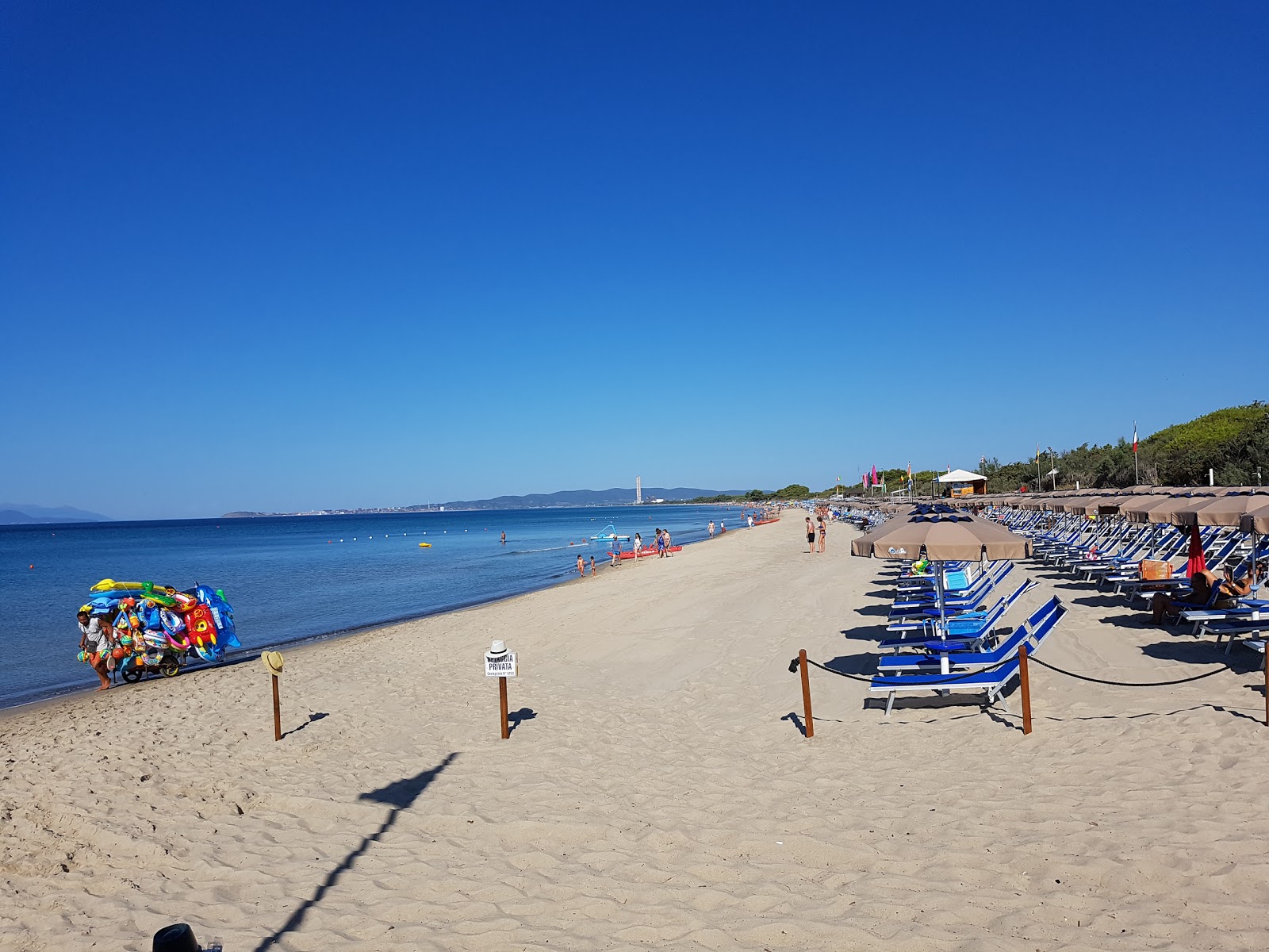 Photo de Spiaggia libera Carbonifera avec droit et long