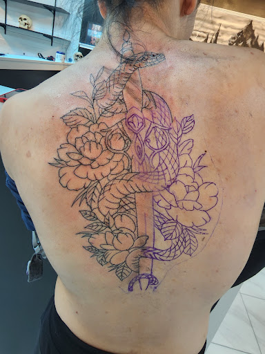 Explore rib tattoos for men ideas, creative tattoo ideas in Milford, available at Boston John Tattoos