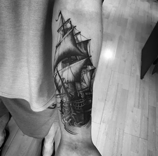 Explore ghost tattoo ideas, creative tattoo ideas in Lawrence, available at Standard Electric Tattooing