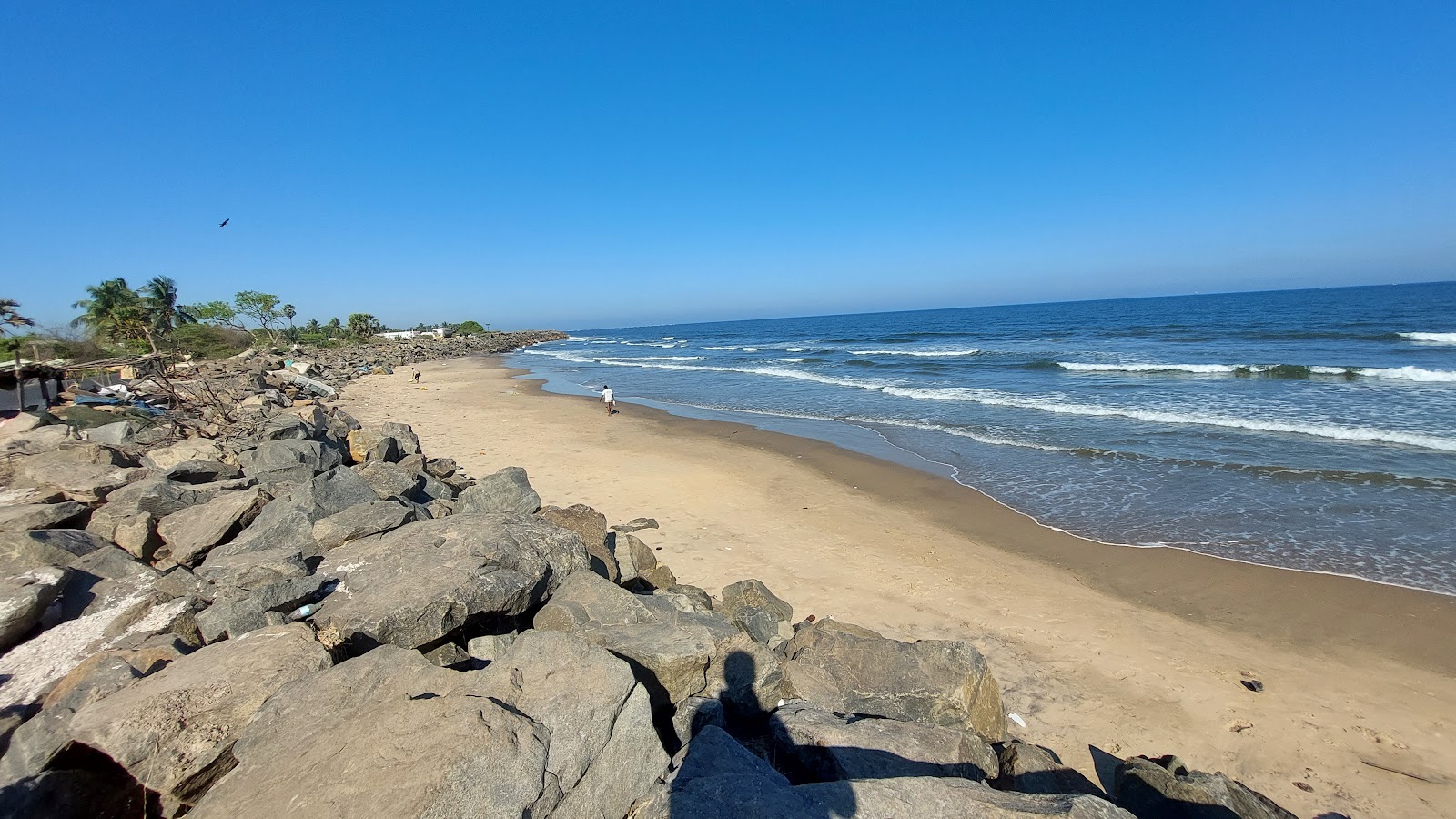 Foto de Uppada Beach com areia bege superfície