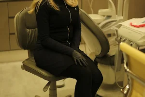 Dra Maria Cecília Mundim Dentista em Monte Carmelo MG image