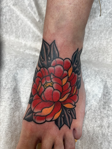 Explore thumb print tattoo ideas, creative tattoo ideas in Muncie, available at Fox & Sparrow Tattoo