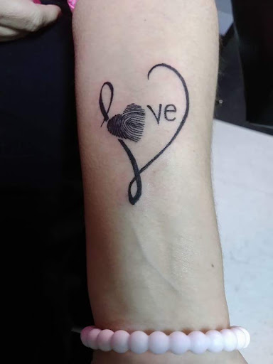 Explore dog tattoo ideas, creative tattoo ideas in Arcade, available at 98 South Tattoo and Piercing