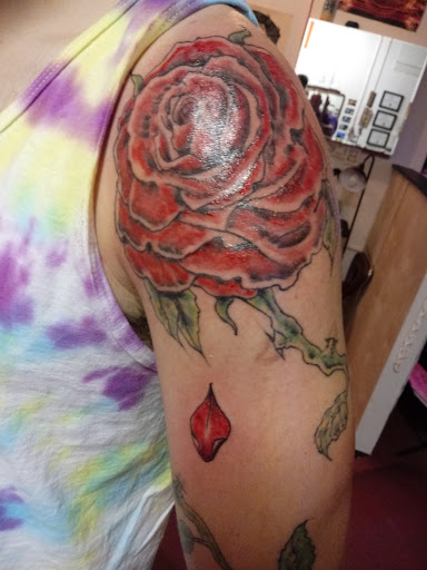 Explore wife name tattoo ideas for husband, creative tattoo ideas in New Orleans, available at Catahoula Tattoo 