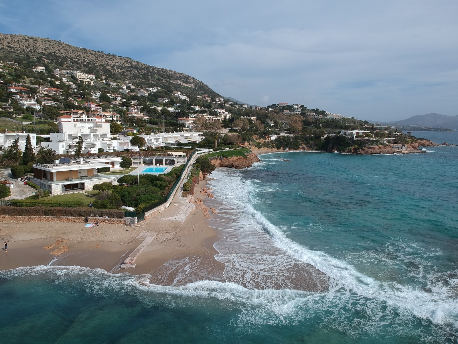 Φωτογραφία του Akrotiri Lombardy με φωτεινή άμμος επιφάνεια