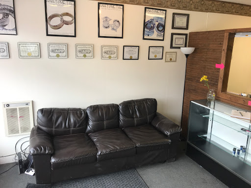 Find tattoo armband ideas for your next unique tattoo in Plattsburgh at One Flight Up Body Piercing