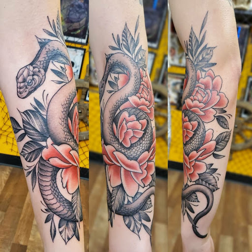 Explore back tattoo ideas for females, creative tattoo ideas in Stockton, available at THE PIRATES LOUNGE TATTOO PARLOR