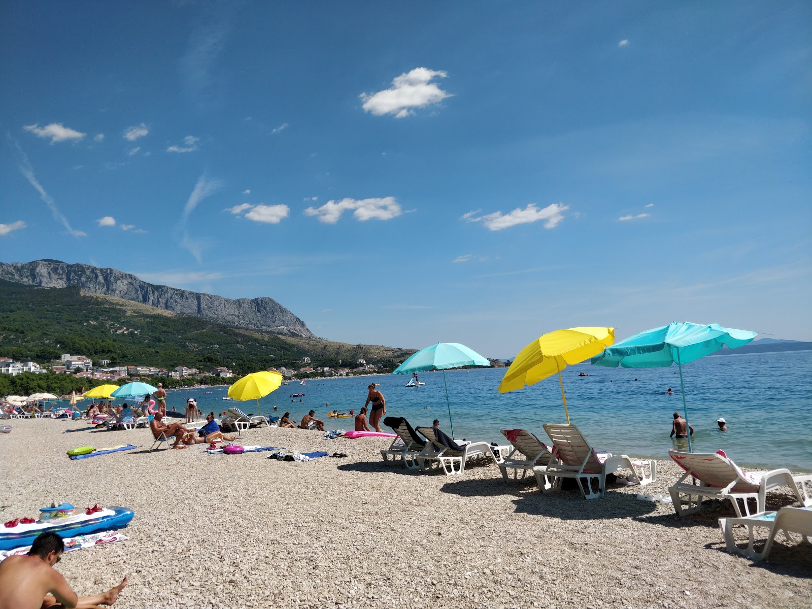 Photo of Slatina beach backed by cliffs