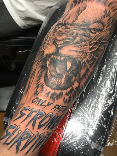 Explore young dolph tattoo ideas, creative tattoo ideas in High Point, available at 21 Aces Tattoo Co.