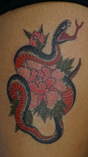 Explore cheetah print tattoos ideas, creative tattoo ideas in Arlington, available at Benchmark Tattoos