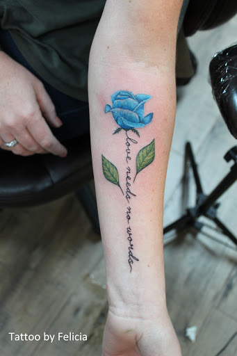 Explore wife name tattoo ideas for husband, creative tattoo ideas in Fort Myers, available at Tiger Lotus Tattoo and Piercing