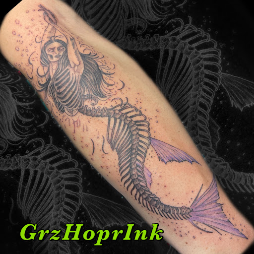 Find dragon tattoo ideas male for your next unique tattoo in Ozone Park at Ozone Tattoo