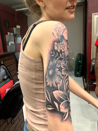 Explore knee cap tattoo ideas for men, creative tattoo ideas in Cape Coral, available at UNRIVALED INK